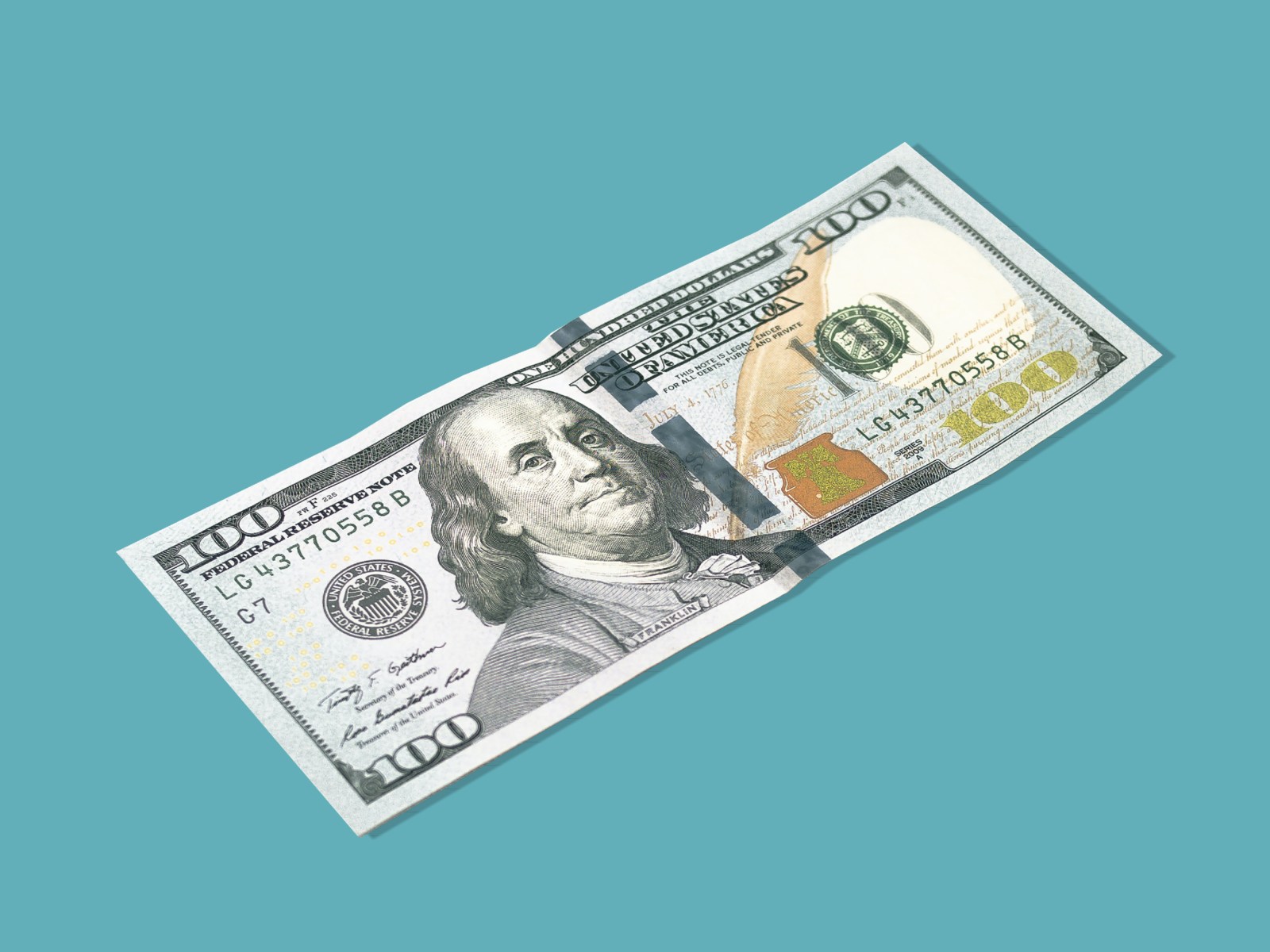 A crisp $100 bill against a teal background, featuring Benjamin Franklin's portrait and security features highlighting U.S. currency design.