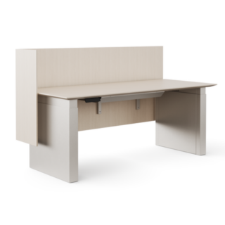 Height-adjustable desk with modesty panel and side privacy screen in light neutral finish.